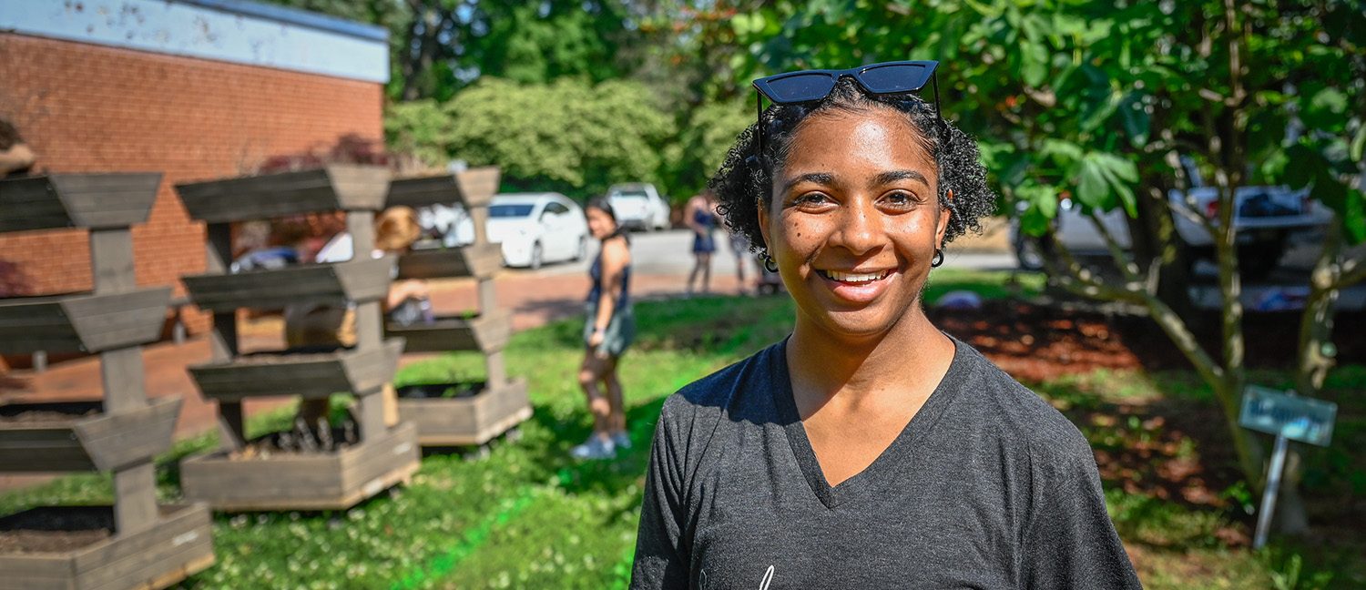 Graduate Student Jasmine Gibson in the BAE student garden.
