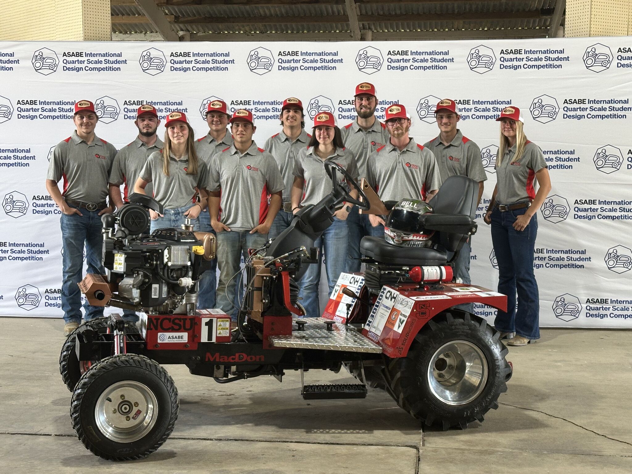 Student tractor team posing with their winning tractor